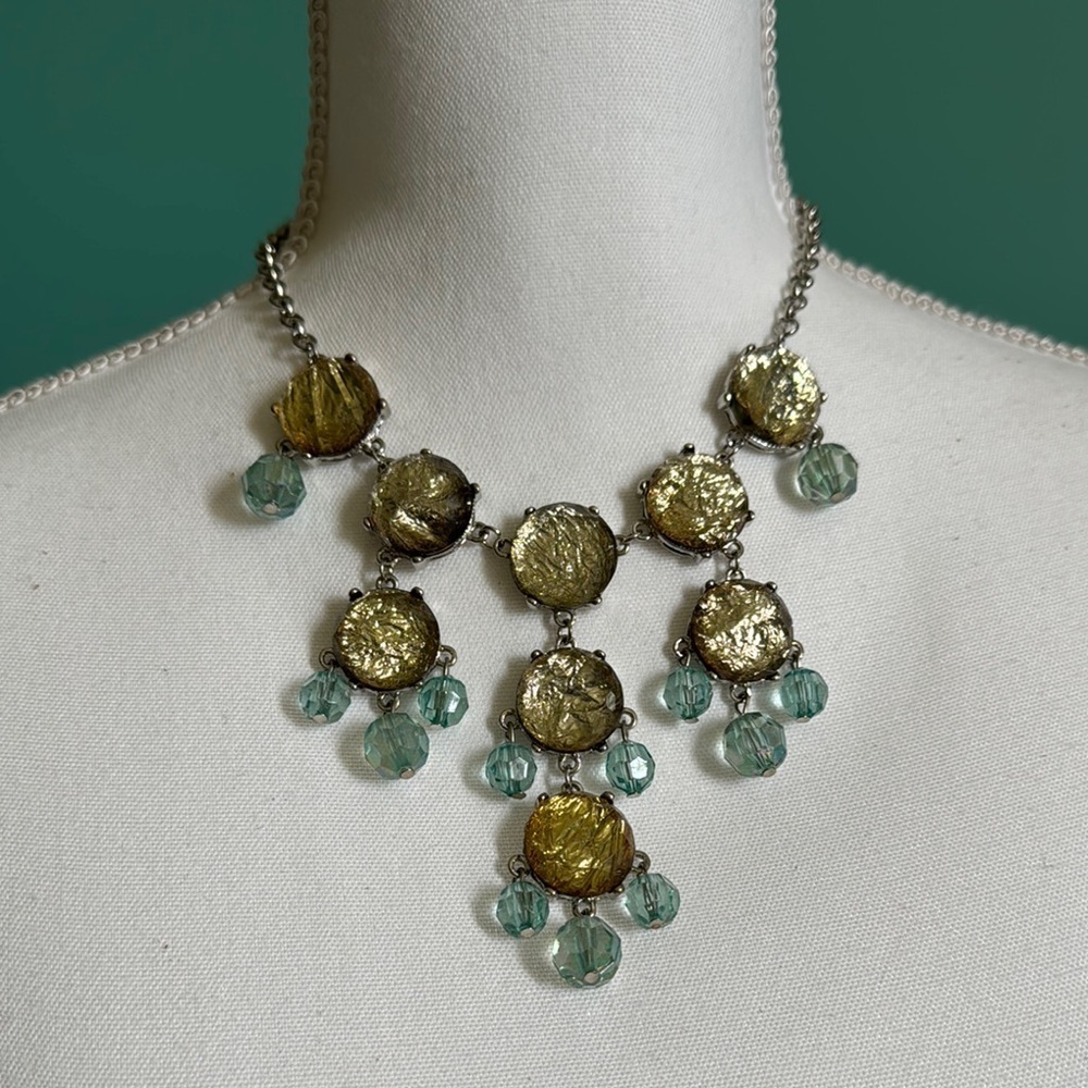 Gold and Silver Cascading Necklace with Ornate Design
